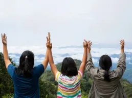 happy-teens-deep-breath-fresh-air-top-mountain-breathing-clean-air